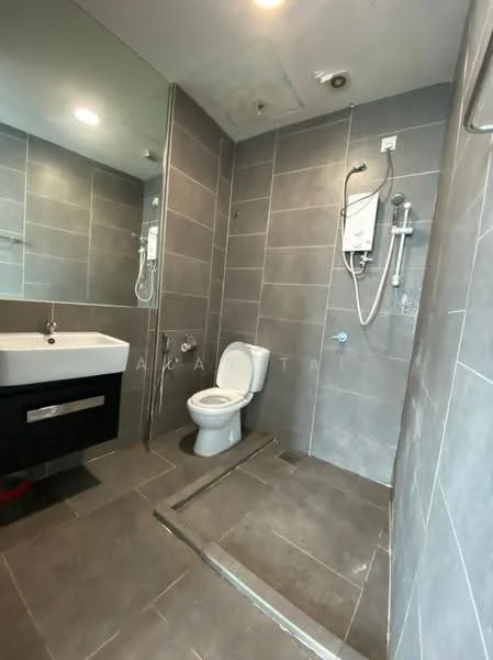 Bathroom features: grey tile flooring, grey wall tiles, white toilet, single-sink vanity with black cabinet, chrome basin mixer faucet, mirror above vanity, shower with handheld showerhead, wall-mounted shower control, exhaust fan, recessed lighting; style: modern.