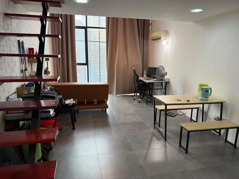 Living features: grey tiled flooring, white painted walls, large floor-to-ceiling window, brown fabric sofa, wooden coffee table, two wooden side tables, desk with computer setup, ceiling-mounted air conditioning unit, curtains, staircase with wooden steps; style: modern.