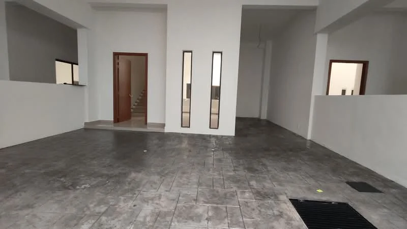 Room features: grey tiled flooring, white painted walls, large windows, open layout, staircase visible in background, two vertical windows, no visible furniture, high ceiling; style: modern.