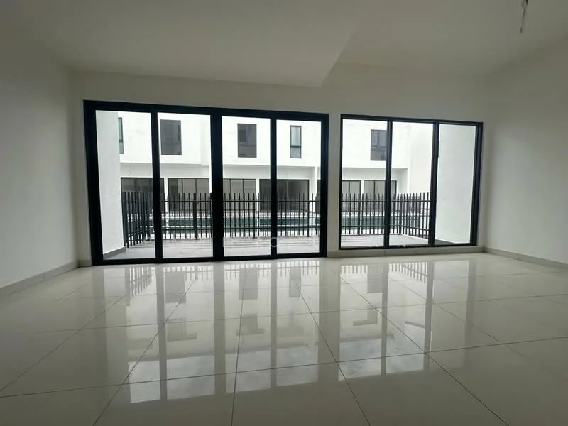 Room features: white painted walls, large floor-to-ceiling windows, sliding glass door, grey tiled flooring, high ceiling, black metal railing, natural light, open layout; style: modern; view: courtyard.
