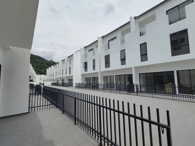 Exterior type: linked terrace house; features: white painted facade, flat roof, two-storey buildings, large windows, black metal railing, paved walkway, surrounded by greenery, open courtyard area; style: modern.