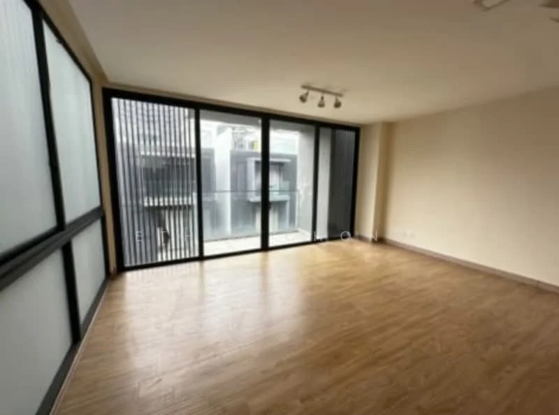 Living features: laminate flooring, white painted walls, recessed downlights, floor-to-ceiling windows, sliding glass door, balcony view, neutral color scheme, open layout; style: modern; view: courtyard.
