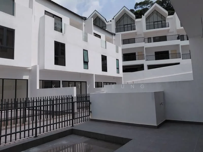 Exterior type: low-rise apartment block; features: white painted facade, flat roof, multiple balconies, large windows, fenced outdoor area, paved walkway, manicured landscaping, modern architectural design; style: modern.