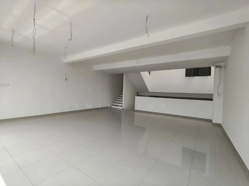 Room features: white painted walls, polished ceramic tile flooring, exposed ceiling with electrical wiring, large open space, staircase visible in background, large windows for natural light, neutral color scheme, no visible furniture or decor; style: modern.