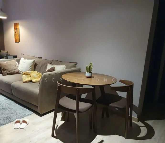 Living features: 3-seater fabric sofa in beige, wooden dining table, 2 wooden dining chairs, decorative wall art, light fixture hanging from ceiling, area rug, light wood flooring, cactus plant on table, throw pillows, slippers on floor; style: modern.