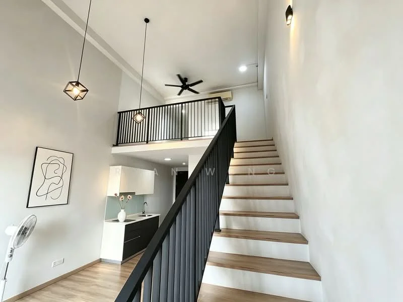 Living features: wooden staircase, black metal railing, pendant lighting, ceiling fan, white painted walls, laminate flooring, open-plan layout, wall-mounted air conditioning unit, framed artwork, kitchenette with white cabinets, kitchen countertop, kitchen backsplash; style: modern.