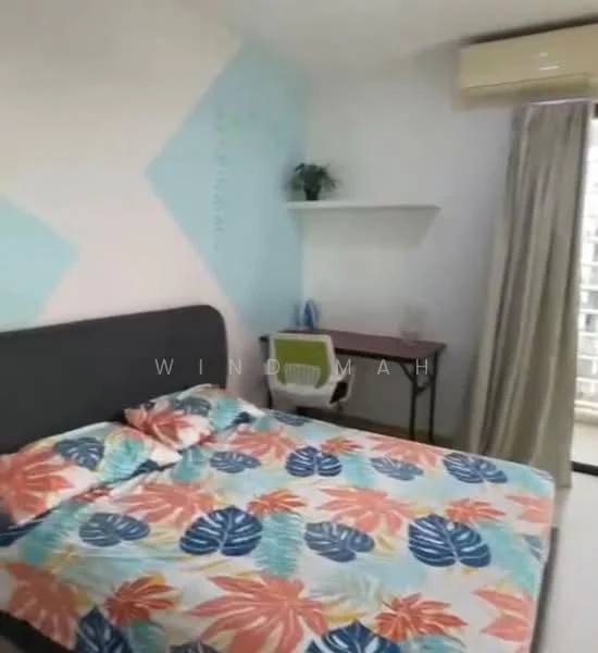 Bedroom features: queen-size bed with colorful floral bedding, light blue accent wall, white walls, wooden flooring, study desk with chair, shelf above desk, curtains, air conditioning unit; style: modern.