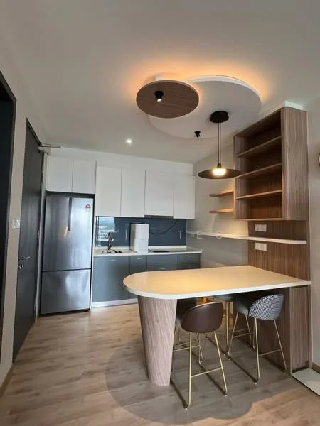 Kitchen features: stainless-steel fridge, white upper cabinets, grey lower cabinets, white countertop, round dining table, golden legs on dining chairs, pendant light fixture, wooden shelving unit, laminate flooring, recessed ceiling lights, sink, kitchen faucet; style: modern.
