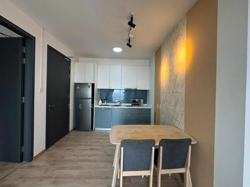 Kitchen features: grey cabinetry, white upper cabinets, stainless-steel fridge, built-in microwave, ceramic cooktop, kitchen countertop, pendant lighting, wooden dining table, two grey upholstered dining chairs, light wood flooring, accent wall with geometric pattern, recessed ceiling light; style: modern.