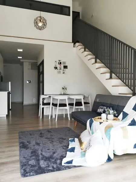 Living features: grey fabric sofa, wooden coffee table, area rug in grey, decorative pillows, pendant light fixture, laminate flooring, white walls, staircase with wooden steps and metal railing, dining table with white chairs, wall art, open layout to kitchen, large windows for natural light; style: modern.