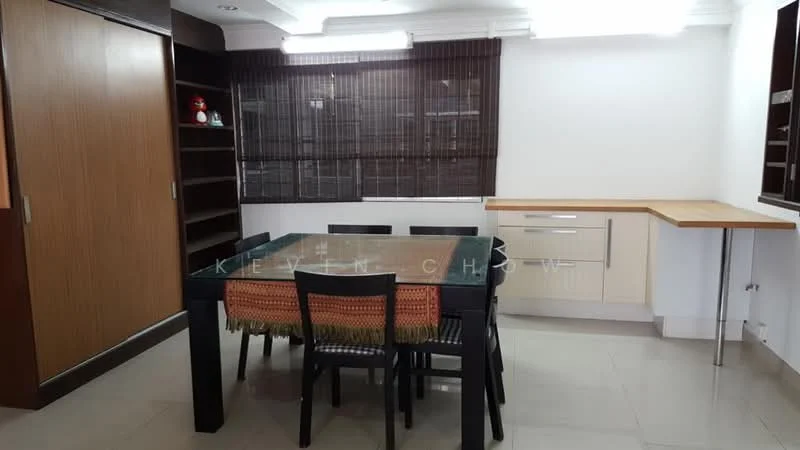 Dining features: glass dining table with black legs, black dining chairs, wooden cabinetry with light finish, countertop with wooden surface, built-in shelving unit, window with bamboo blinds, grey tiled flooring, recessed ceiling lights; style: modern.