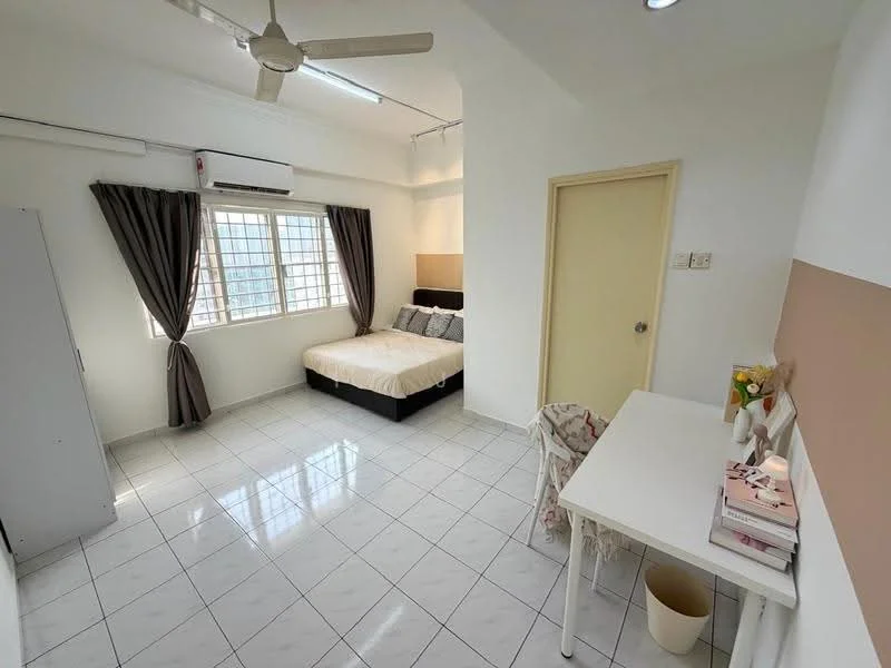 Bedroom features: queen-size bed with beige bedding, upholstered headboard, 2 bedside lamps, white walls, white tiled flooring, floor-to-ceiling window with sheer curtains, wall-mounted air conditioning unit, ceiling fan, study desk with chair, wardrobe, decorative items on desk; style: modern.