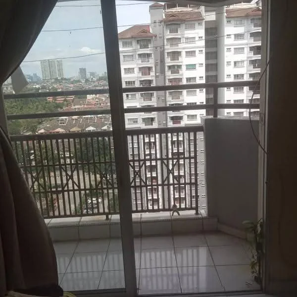 Room features: sliding glass door, balcony with railing, ceramic tile flooring, curtains, city view, visible high-rise buildings, outdoor space, potted plant; view: city.