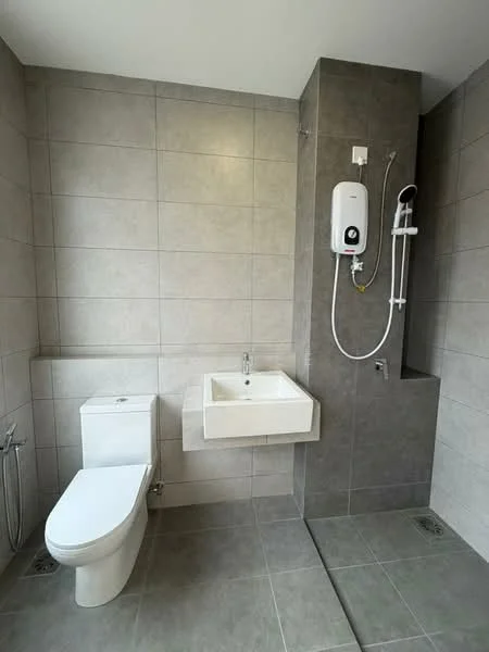 Bathroom features: grey ceramic tile walls, grey ceramic tile flooring, wall-mounted toilet, floating sink with chrome faucet, shower area with handheld shower, water heater mounted on wall, glass shower partition, recessed lighting; style: modern.