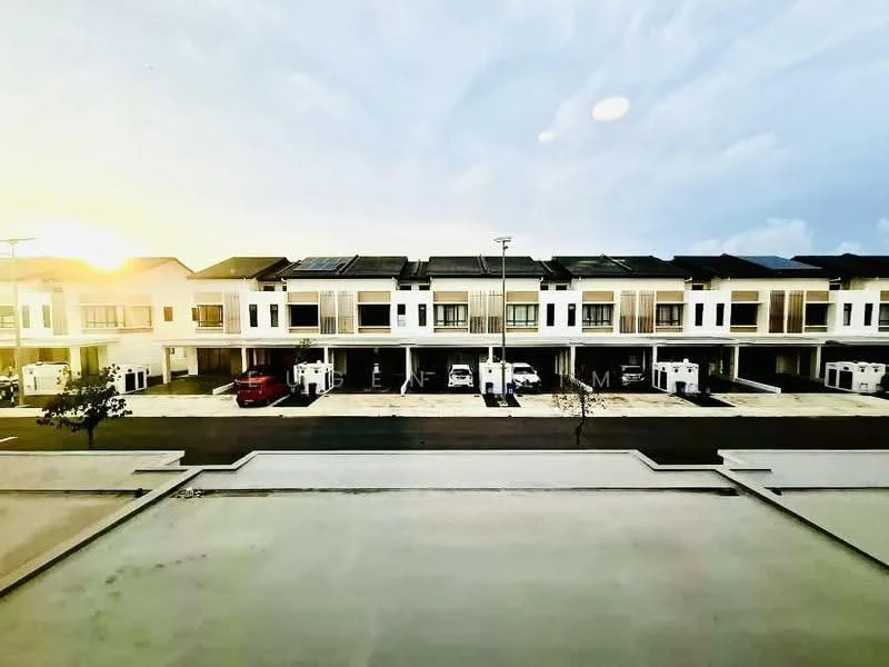 Exterior type: linked terrace house; features: white painted facade, flat roof, solar panels on roof, two-storey, driveway with interlocking pavers, manicured lawn, parking spaces visible, street view, surrounded by mature greenery; style: modern.