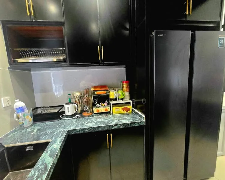 Kitchen features: black cabinetry, black refrigerator, marble countertop with green veining, stainless-steel sink, dish rack, kitchen utensils, coffee maker, storage containers, wall-mounted cabinet, backsplash with grey tiles; style: modern.