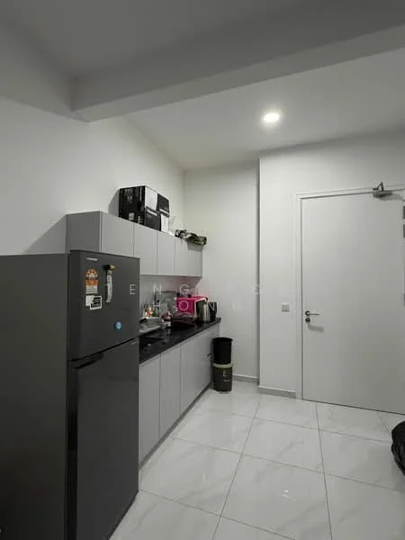 Kitchen features: grey cabinetry, black countertop, stainless-steel fridge, built-in sink, kettle, toaster, microwave, wall-mounted shelves, white tiled flooring, recessed LED downlights, white painted walls, door to hallway; style: modern.
