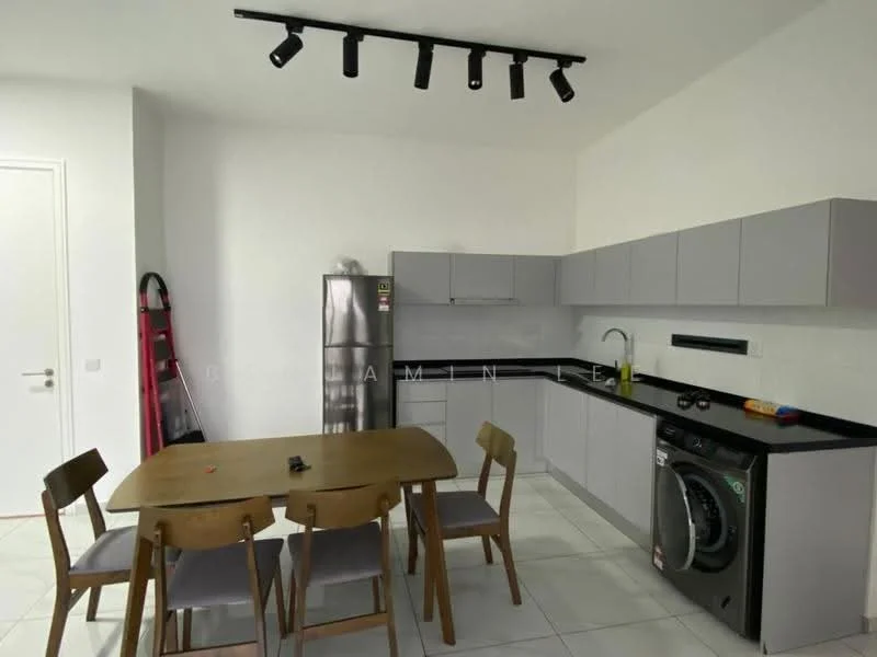 Kitchen features: grey cabinetry, black countertop, stainless-steel fridge, built-in washing machine, single-bowl stainless-steel sink, chrome pull-down faucet, 4-burner gas hob, track lighting, white walls, white tiled flooring, dining table with 4 wooden chairs; style: modern.