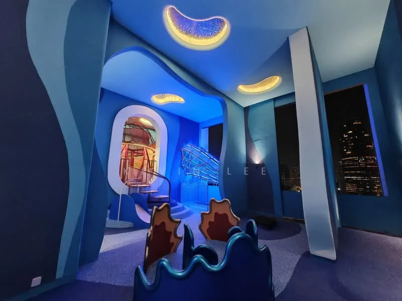 Room features: blue painted walls, curved architectural elements, unique ceiling lights, carpeted flooring, colorful play area, staircase, large windows with city view, decorative seating; style: modern; view: city.