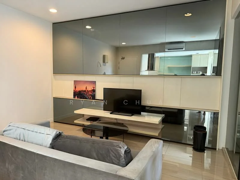 Living features: grey fabric sofa, glass coffee table, wall-mounted TV, TV console with storage, mirrored wall panels, recessed ceiling lights, tile flooring, air conditioning unit; style: modern.