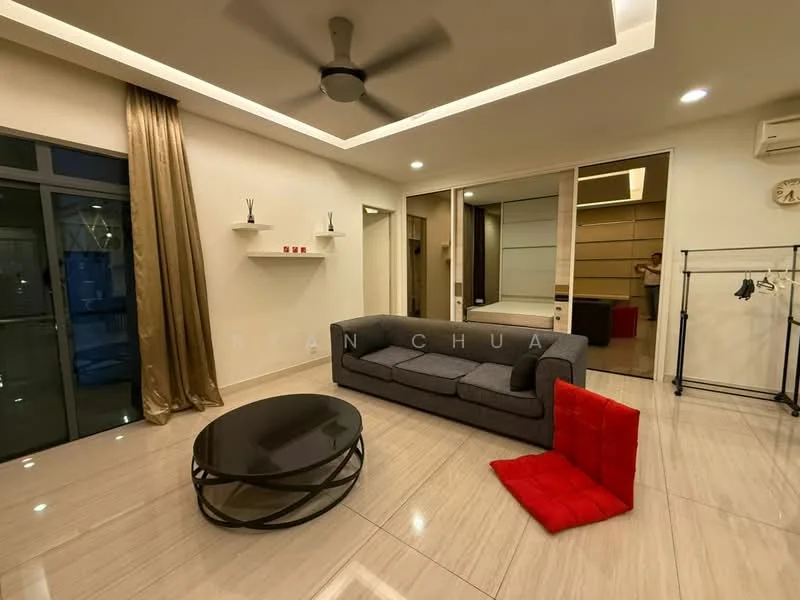 Living features: grey fabric sofa, round coffee table with black metal base, 5-blade ceiling fan with light, cream painted walls, marble tile flooring, floor-to-ceiling windows, sheer curtains, decorative wall shelves, area rug with geometric pattern, wall-mounted air conditioning unit; style: modern. Room features: open closet rack, wood cabinetry, light-colored walls, doorway leading to another room.