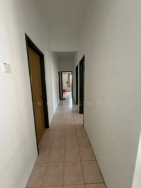 Hallway features: white painted walls, tile flooring, doorway to rooms, light switch, neutral color scheme, narrow corridor, no visible decor, natural light from openings.