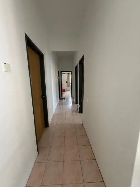 Hallway features: white painted walls, tile flooring, doorway to rooms, light switch, neutral color scheme, straight corridor layout.