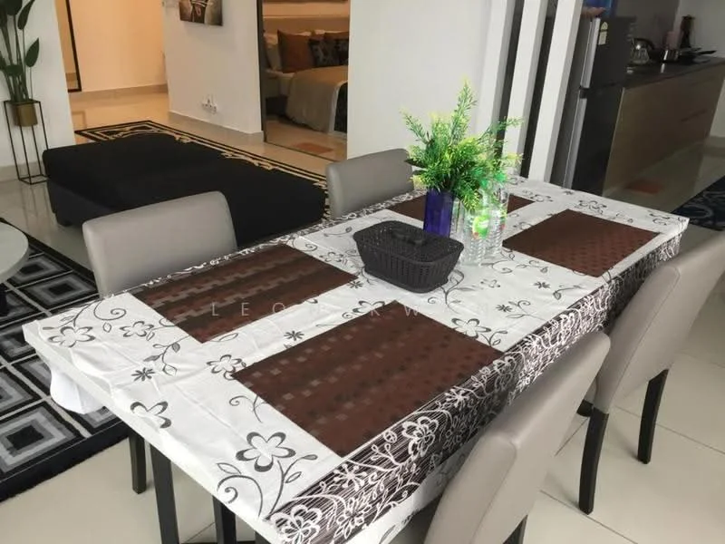 Dining features: dining table with floral tablecloth, 4 upholstered dining chairs, decorative vase with flowers, black woven basket, water bottles, ceramic floor tiles, wall-mounted artwork in background, open layout to living area; style: modern. Living features: black fabric sofa, area rug with geometric pattern, coffee table, wall-mounted TV, decorative wall art; style: modern.