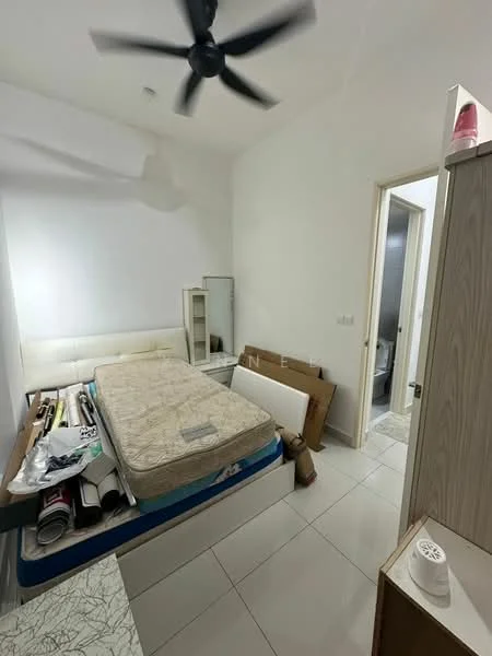 Bedroom features: white painted walls, tile flooring, ceiling fan, queen-size bed, bedside table, mirror cabinet, doorway to bathroom, decorative items on bed, rolled-up posters, unmade bed.