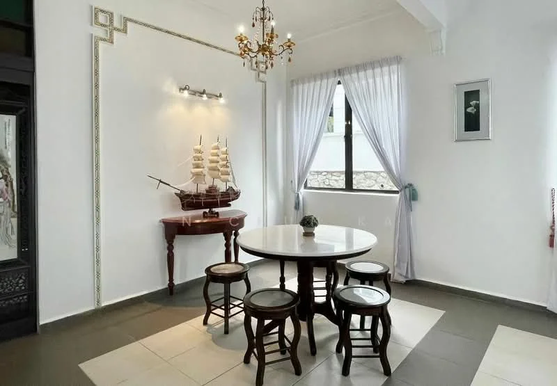Dining features: round dining table with white top, wooden dining chairs, chandelier with multiple bulbs, white painted walls, large window with sheer curtains, decorative ship model on table, framed artwork on wall, grey tiled flooring, white tiled flooring, wall with decorative trim; style: modern.