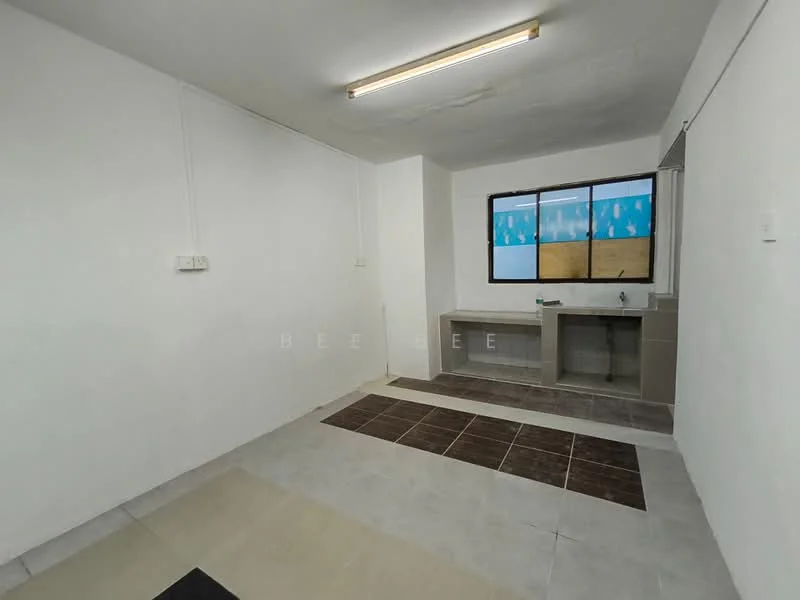 Kitchen features: white painted walls, tile flooring in light grey, tile flooring in dark brown, single-bowl sink, countertop with backsplash, window with view of outdoor area, fluorescent ceiling light.
