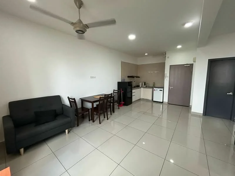Living features: grey fabric sofa, 4-seater dining table, wooden dining chairs, white painted walls, glossy ceramic tile flooring, recessed LED downlights, ceiling fan, kitchenette with countertop, stainless-steel fridge, built-in cabinets, microwave, kettle; style: modern.