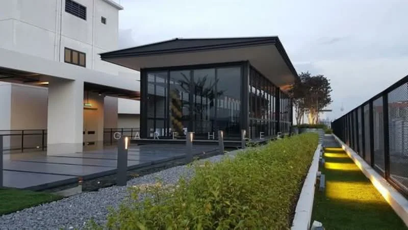Exterior type: clubhouse; features: glass facade, flat roof, surrounded by landscaped garden, manicured lawn, stone-paved walkway, outdoor lighting, fence, paved driveway; style: modern.