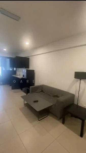 Living features: grey fabric sofa, coffee table, black side table, tile flooring, white painted walls, recessed downlights, floor-to-ceiling windows, black floor lamp; style: modern. Kitchen features: black cabinetry, stainless-steel fridge, built-in oven, countertop, open layout; style: modern.