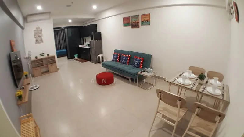 Living features: grey fabric sofa with red and blue cushions, round red ottoman, wooden TV console, wall-mounted TV, dining table with four wooden chairs, ceramic plates and cutlery on the dining table, light beige tiled flooring, white painted walls, decorative wall art, recessed ceiling lights; style: modern. Kitchen features: black cabinetry, stainless-steel fridge, built-in oven, countertop with bar stools, open layout to living area; style: modern.