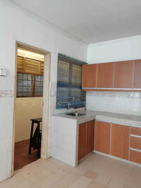 Kitchen features: brown wooden cabinetry, stainless-steel sink, chrome faucet, white tiled backsplash, white tiled flooring, window with blinds, countertop with storage below, doorway leading to another room. Room features: wooden flooring, window with wooden frame.