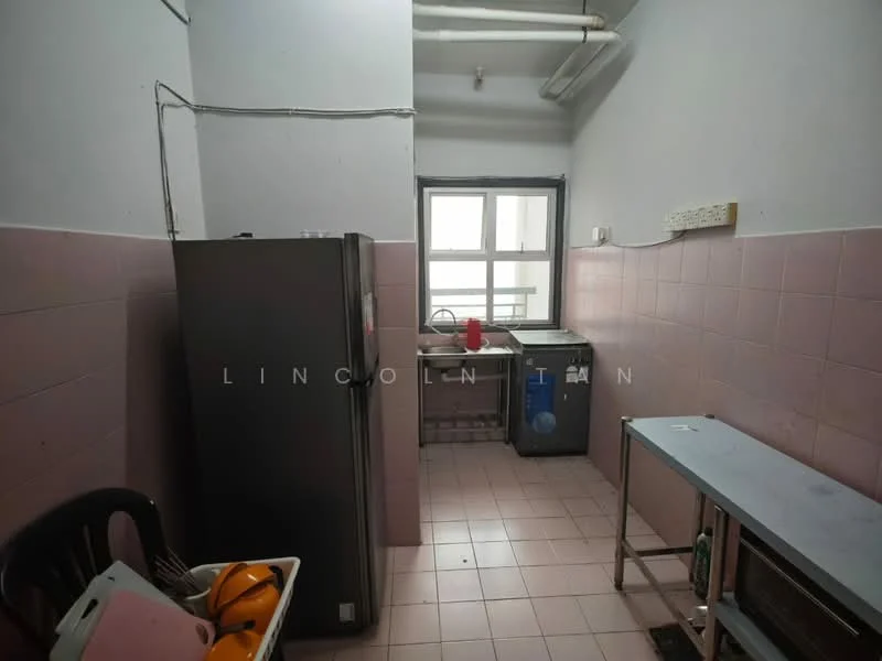Kitchen features: pink tiled walls, white ceiling, single-bowl stainless-steel sink, chrome pull-down faucet, built-in kitchen cabinet, freestanding fridge, washing machine, stainless-steel work table, tile flooring.