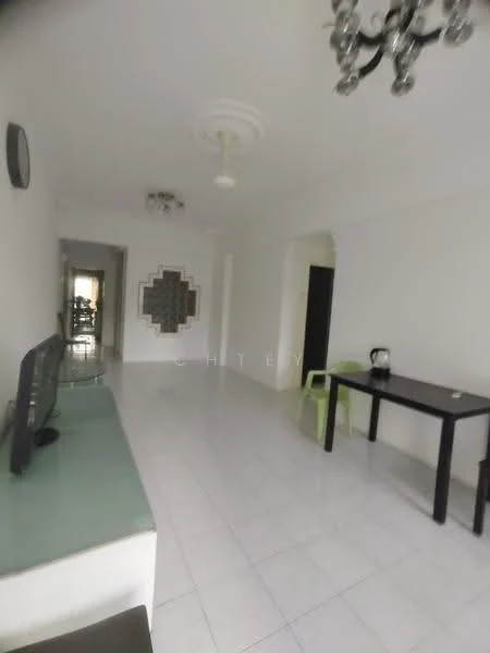 Living features: white painted walls, glossy white tile flooring, ceiling rose, chandelier, 5-blade ceiling fan, TV console, wall-mounted TV, black dining table, green plastic chair, kettle on table, decorative wall panel, doorway leading to other rooms; style: modern.
