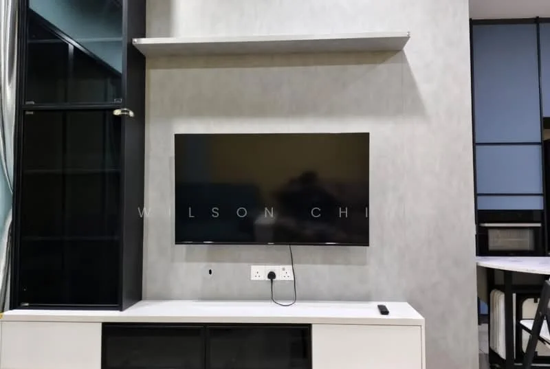 Living features: wall-mounted TV, white TV console, black glass cabinet, grey accent wall, shelving unit above TV, visible electrical outlets, curtains, flooring not visible; style: modern.