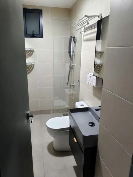 Bathroom features: grey tiled walls, cream tiled flooring, walk-in shower with glass enclosure, rain shower head, handheld shower, single-sink vanity with black cabinet, chrome basin mixer, framed mirror, one-piece toilet, towel rack, window for natural light; style: modern.