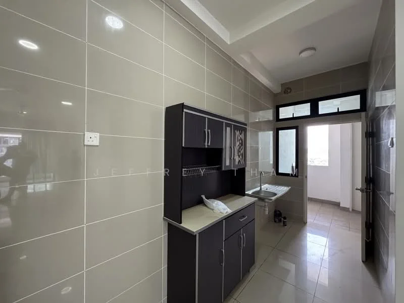 Laundry features: grey tiled walls, light grey floor tiles, built-in cabinetry with dark grey finish, countertop surface, window for natural light, sink, door leading to balcony, ceiling light fixture; style: modern.