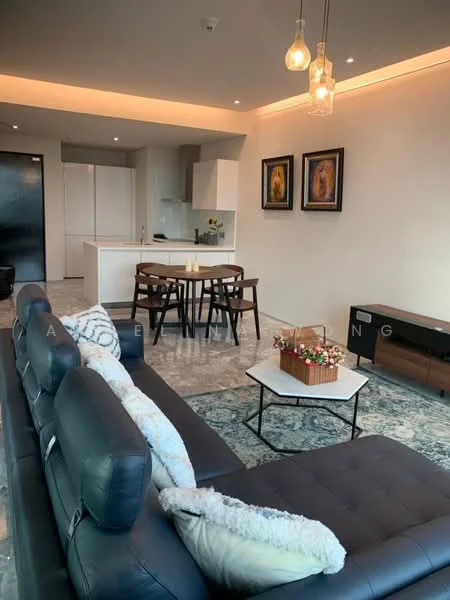 Living features: 3-seater leather sofa in black, decorative throw pillows, coffee table with white top, area rug with geometric pattern, wall-mounted TV, TV console in dark wood, dining table for 4 with wooden chairs, pendant lighting with multiple bulbs, recessed ceiling lights, open kitchen layout, grey marble flooring, painted walls in light color, framed artwork on walls; style: modern. Kitchen features: white cabinetry, kitchen island with seating, stainless-steel appliances, built-in oven, microwave, sink with faucet, countertop with smooth surface; style: modern.