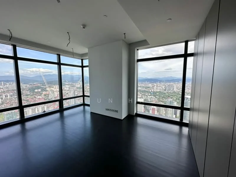 Room features: floor-to-ceiling windows, city view, dark wood flooring, white painted walls, recessed downlights, open layout, corner room, high ceiling; style: modern; view: city.