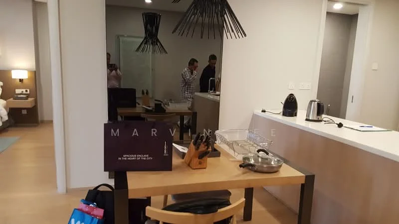 Room features: wooden flooring, white painted walls, recessed downlights, pendant light, kitchen island, dining table with chairs, kitchen appliances, countertop, open layout, decorative items on table; style: modern.