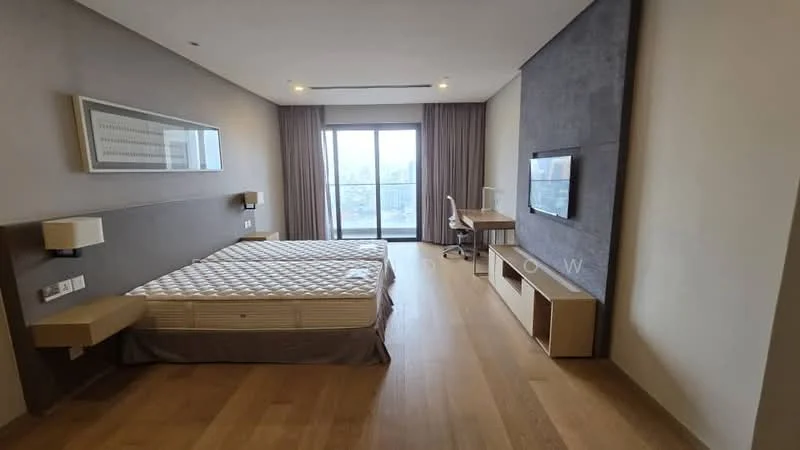 Bedroom features: queen-size bed, wooden flooring, floor-to-ceiling windows, curtains, wall-mounted TV, study desk, wooden TV console, wall-mounted light fixtures, neutral wall color, decorative artwork, open space layout; style: modern; view: city.