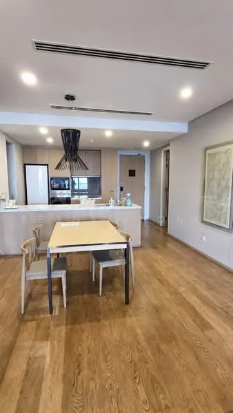 Dining features: wooden dining table, 4 dining chairs, pendant light fixture, open kitchen layout, light wood flooring, white cabinetry, stainless-steel refrigerator, built-in oven, countertop with bar seating, neutral wall color, recessed ceiling lights; style: modern.
