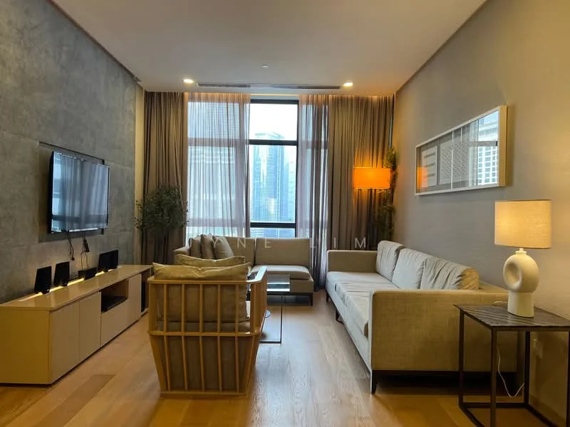 Living features: grey accent wall, light wood flooring, floor-to-ceiling windows, sheer curtains, 3-seater fabric sofa in beige, 2-seater fabric sofa in light grey, wooden coffee table, TV console, wall-mounted TV, decorative table lamp, wall-mounted artwork, potted plant; style: modern; view: city.
