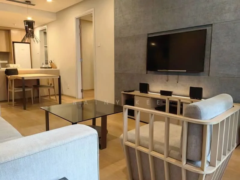 Living features: light wood flooring, grey accent wall, wall-mounted TV, glass coffee table, 2-seater fabric sofa in beige, open shelving unit, built-in cabinetry, recessed downlights, pendant light fixture, dining table with chairs; style: modern.
