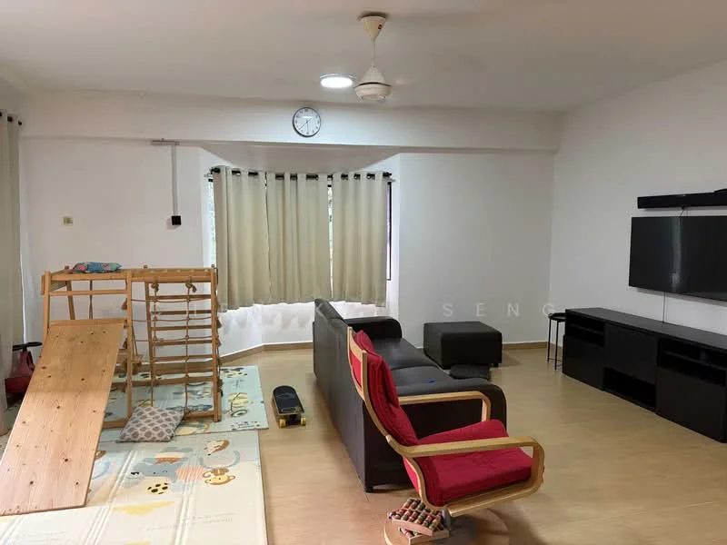 Living features: light wood flooring, white painted walls, ceiling fan, large window with sheer curtains, sofa in dark color, TV console, wall-mounted TV, play area with climbing frame, area rug with playful design, clock on wall; style: modern.