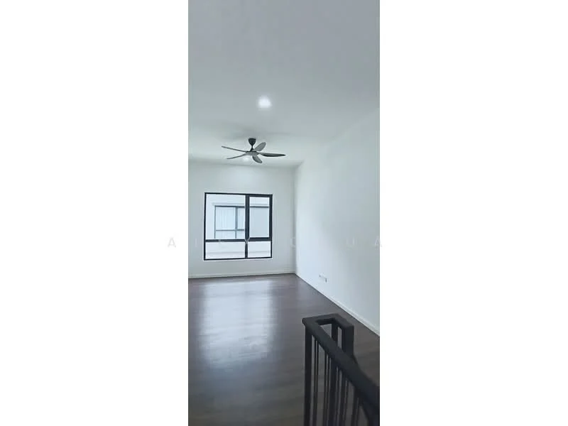Room features: white painted walls, wooden flooring, 5-blade ceiling fan with light, large window with black frame, natural light, open space, staircase railing; style: modern.
